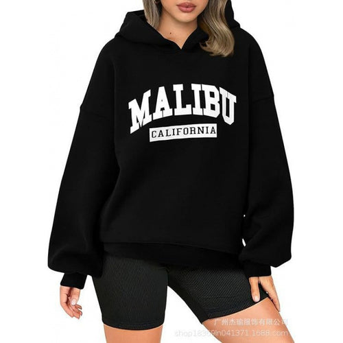 Women's casual hoodie with oversized cut and eye-catching print Chic & Stil