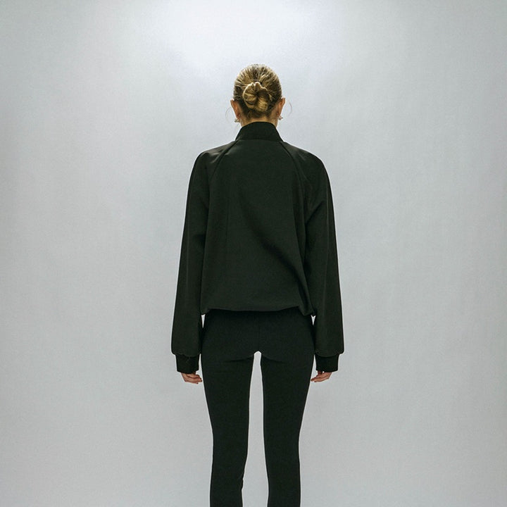 Women's sporty transitional jacket with high collar and practical zip pockets Lune London