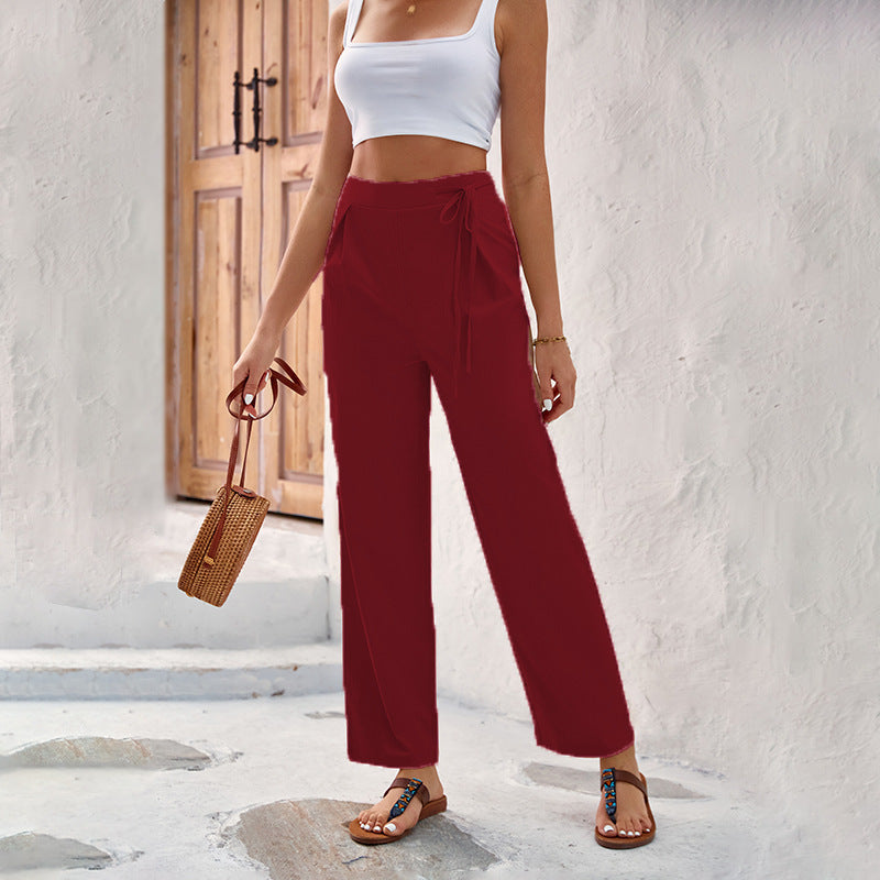 Loose summer pants for women with elastic waistband and tie belt Lune London