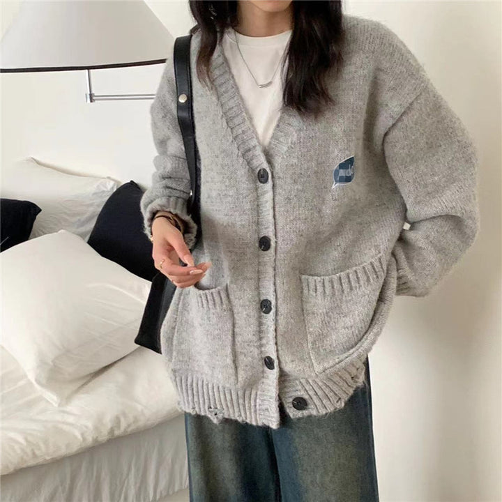 Ladies Thick Cardigan with practical pockets and Chic and Stylish button details