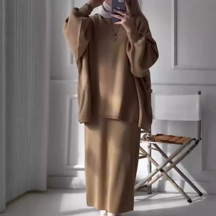 Elegant set for women made up of a casual sweater and a chic midi skirt.