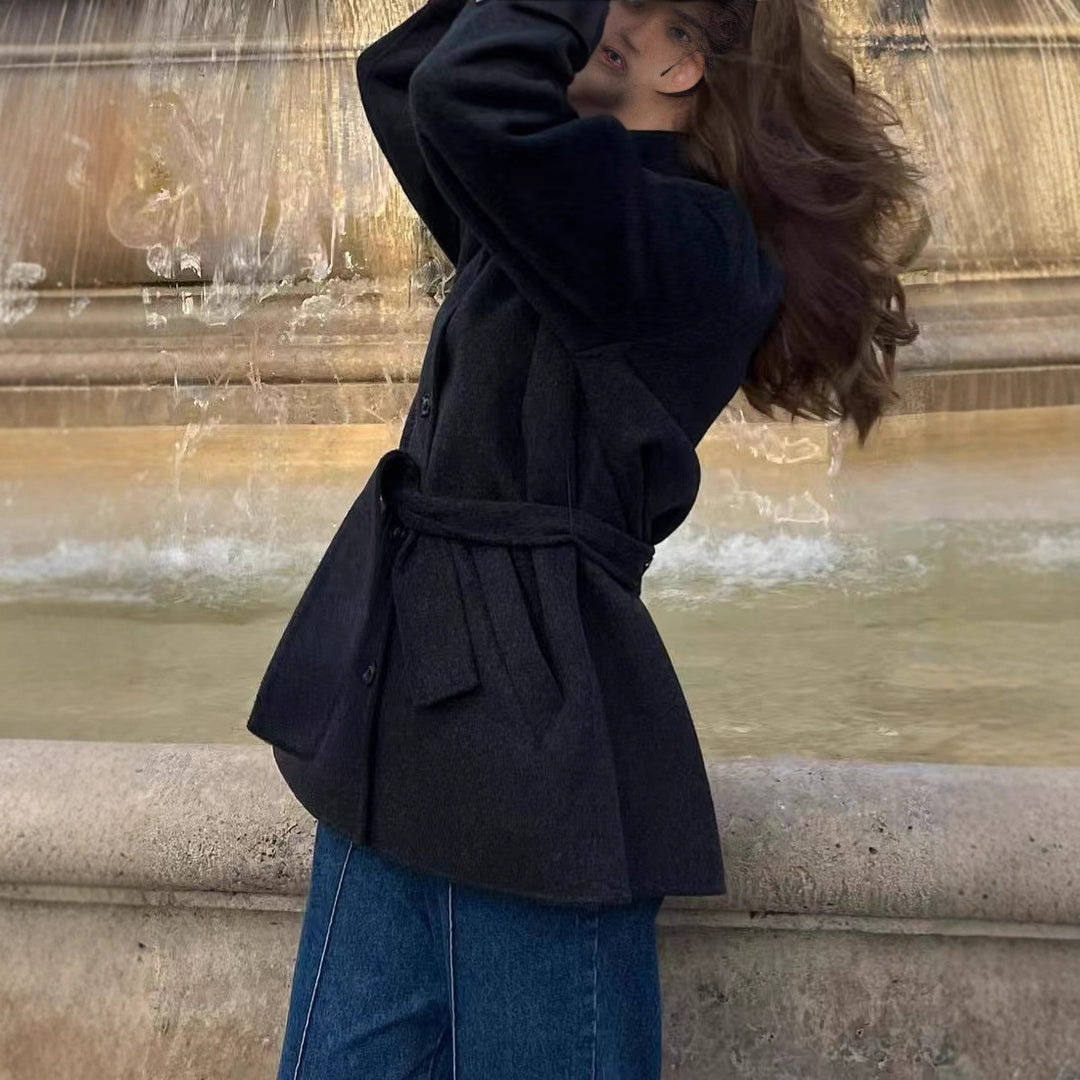 Modern wool jacket for women with adjustable belt and high collar Lune London