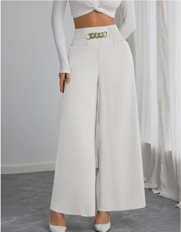 Wide palazzo trousers for women with elastic waistband and decorative belt Lune London