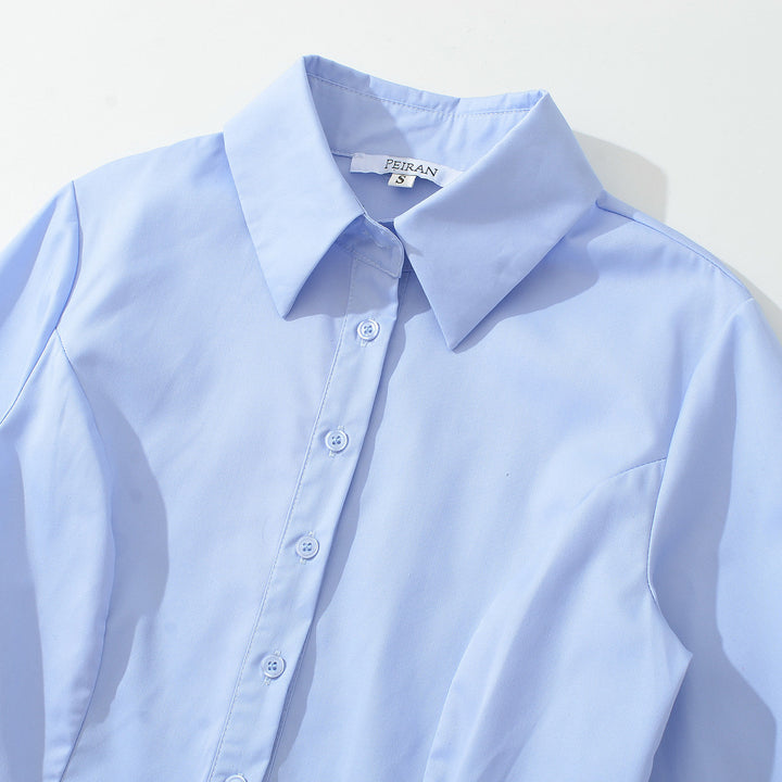 Women's fitted peplum blouse with shirt collar and double-layered hem