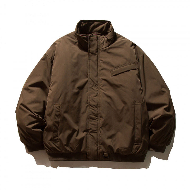 Unisex Boxy-padded transition jacket with high stand-up collar and utility pockets Amarae