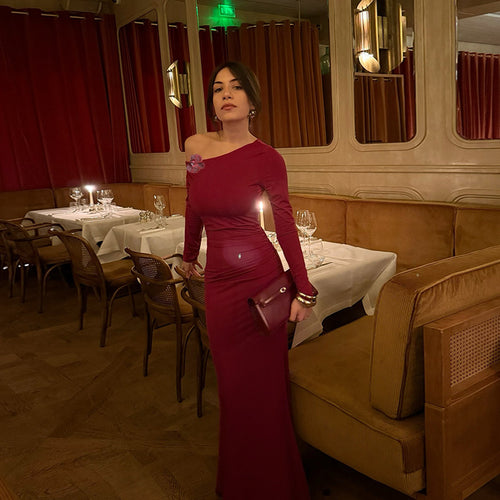 Ladies elegant long-sleeved evening dress with asymmetric neckline and figure-flattering design