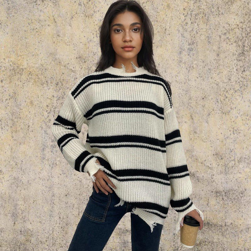 Oversized chunky knit sweater for women with fringes and cross stripes Lune London