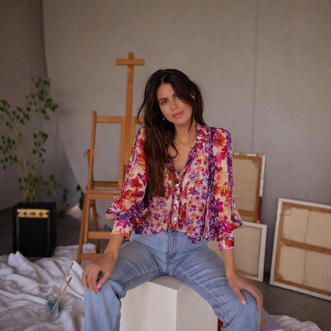 Women's blouse with floral patterns and elegant flutter sleeves Lune London