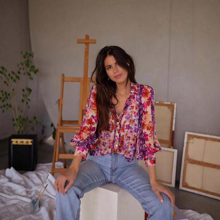 Women's blouse with floral patterns and elegant flutter sleeves Lune London
