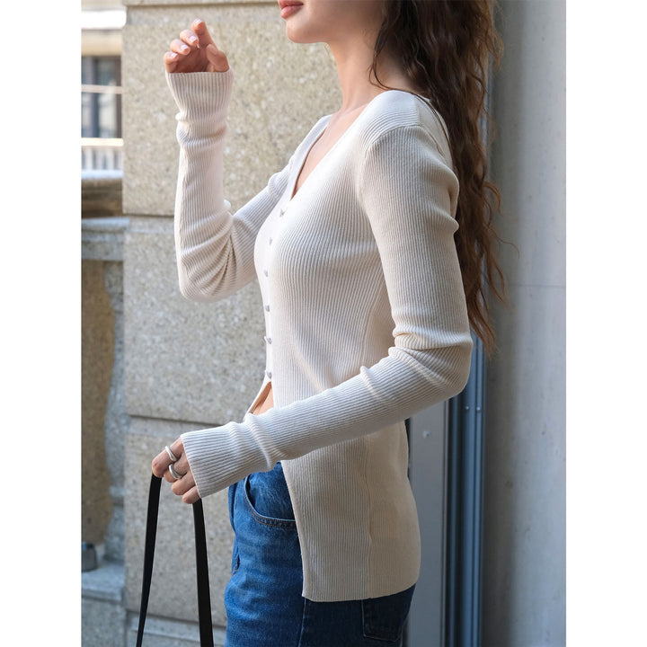 Women fitted ribbed V-neck top with diagonal button placket and extended sleeves Amarae