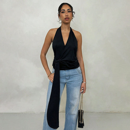 Haut enveloppant pour femmes avec un décolleté V profond et des détails de nœud élégants Chic & Stil