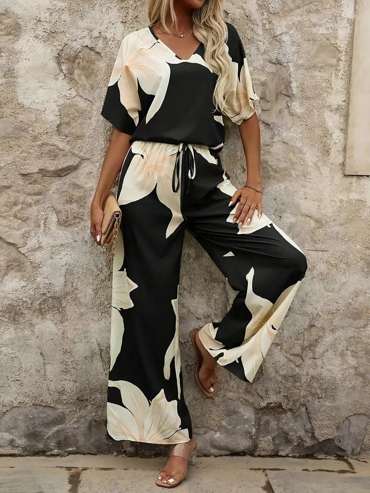 Ladies Elegant Jumpsuit with floral patterns and wide leg Lune London