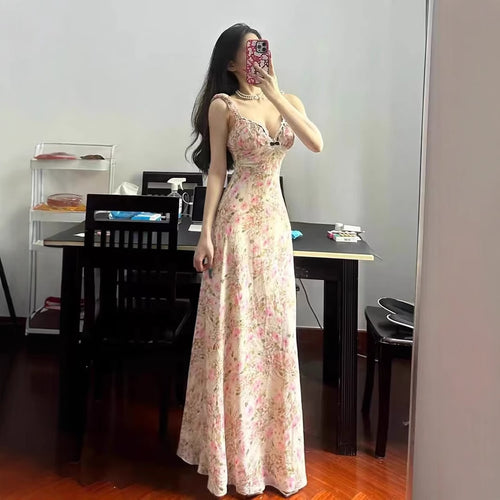 Maxi dress for women with floral design, frills, and elegant cut Amarae