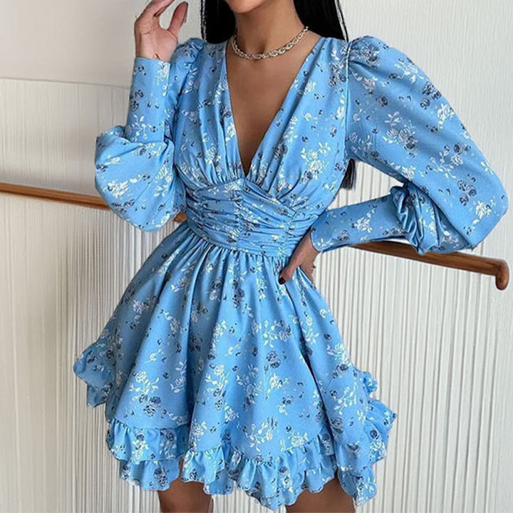 Robe à fleurs ludique pour femmes avec des manches volumineuses et une jupe froncée Chic & Stil