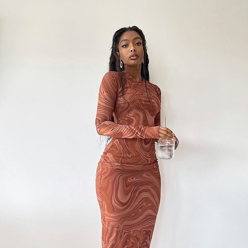 Elegant long-sleeve dress for women with a modern marble pattern and a fitted cut Lune London