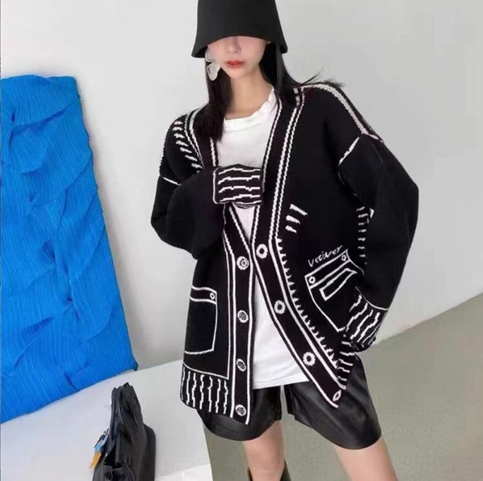 Ladies oversized sweater with creative design and large buttons Lune London
