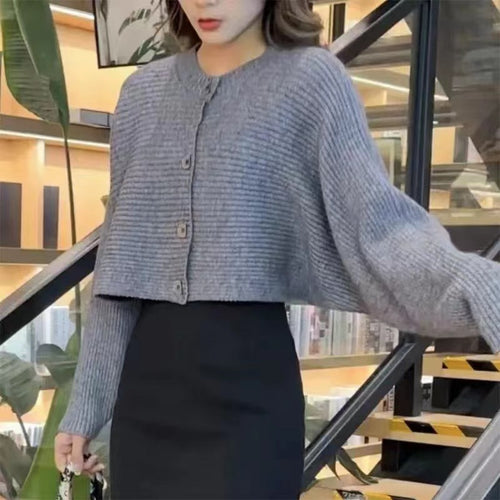 Cardigan ample pour femmes avec détails de boutons et coupe large Chic & Stil