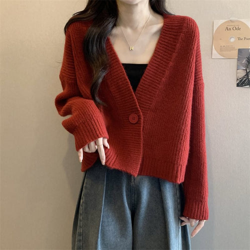 Cardigan tendance femme avec décolleté en V profond et fermeture à boutons Chic & Stil