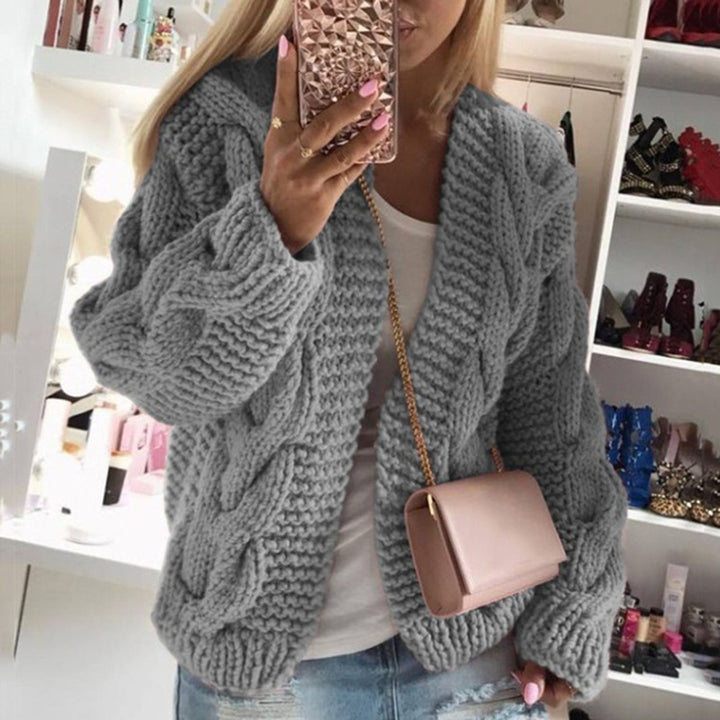 Women’s knit jacket with a chunky cable knit pattern and a loose fit Lune London
