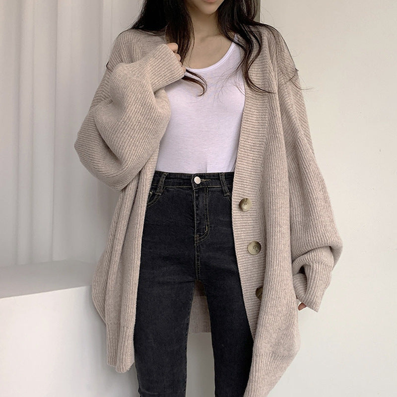 Ladies large knit cardigan with oversized cut and decorative buttons Lune London
