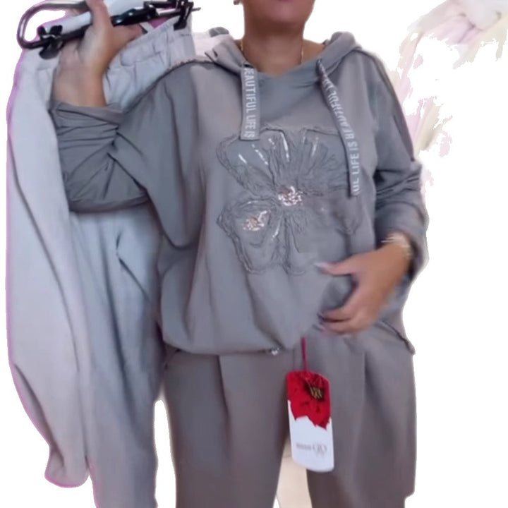 Haut de survêtement décontracté pour femmes avec un motif floral délicat et une broderie de haute qualité Chic & Stil