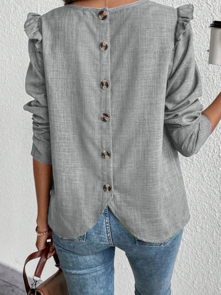 Women's blouse with ruffled sleeves and decorative buttons Lune London
