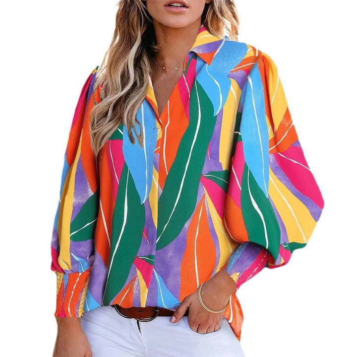 Shirt blouse for women with a vibrant floral design featuring off-shoulder and elastic cuffs Lune London
