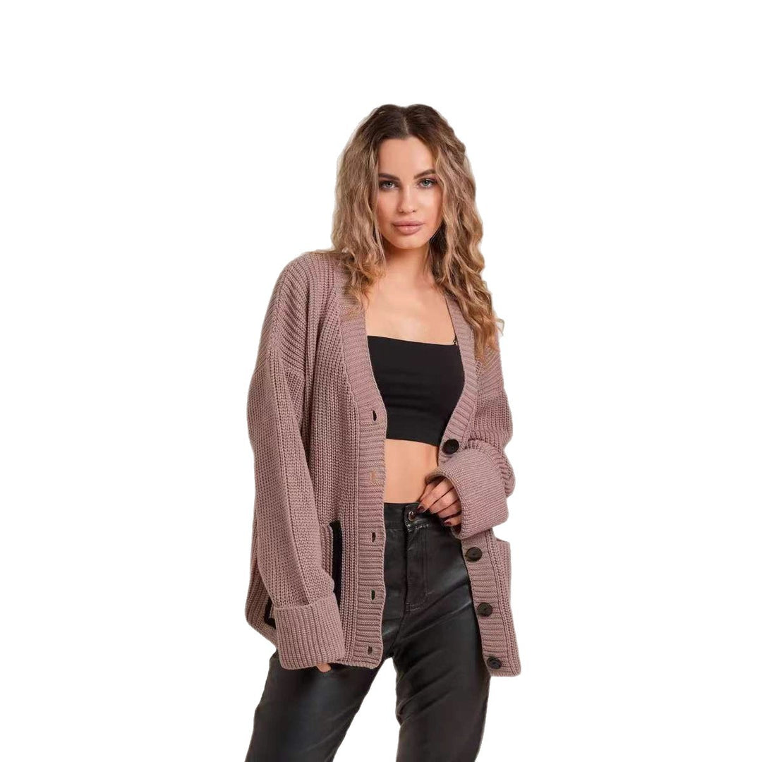 Women Large knitted cardigan with decorative button details and relaxed fit Lune London