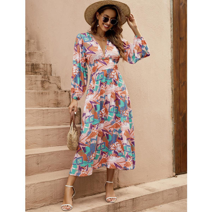 Elegant maxi dress for ladies with deep V-neck and voluminous sleeves Lune London