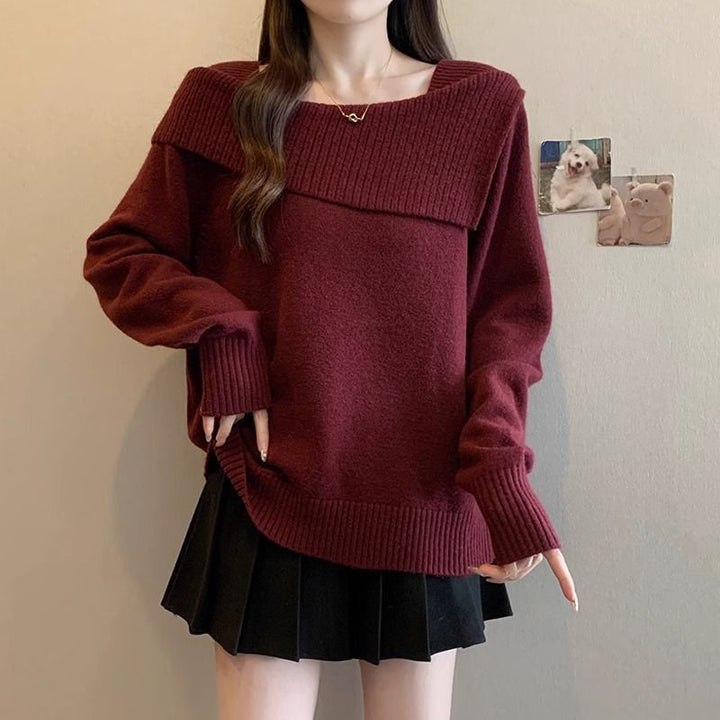 Pull féminin à la mode avec encolure asymétrique Chic & Stil