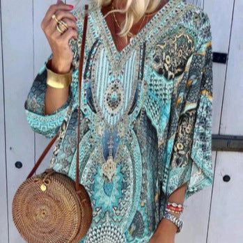 Light kaftan dress for women with a deep V-neckline and bell sleeves Lune London