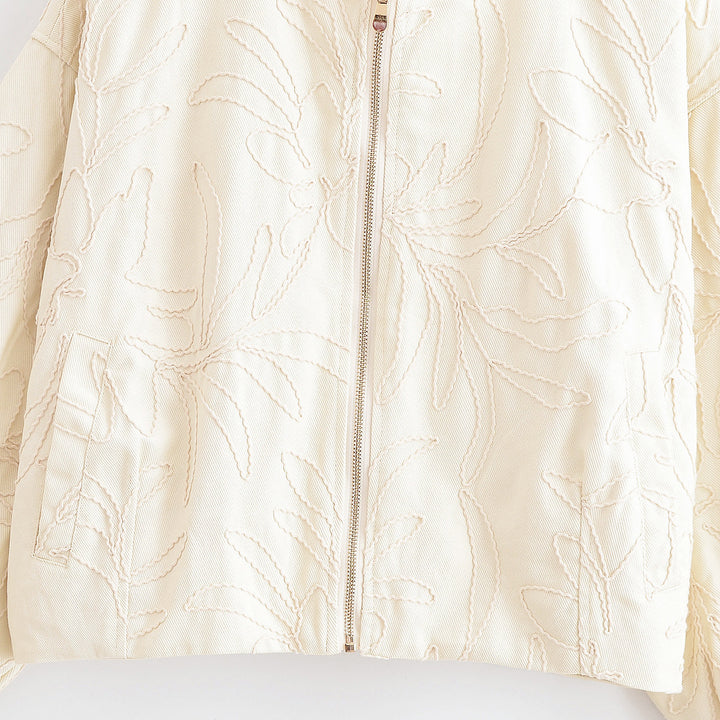 Haut matelassé pour femmes avec broderie florale Chic & Stil