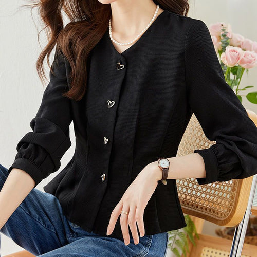 Blouse élégante pour femmes avec des détails de bouton en forme de cœur et des manches volumineuses Chic & Stil