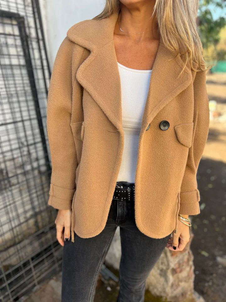 Elegant oversized blazer jacket for women in textured fabric with practical pockets Lune London