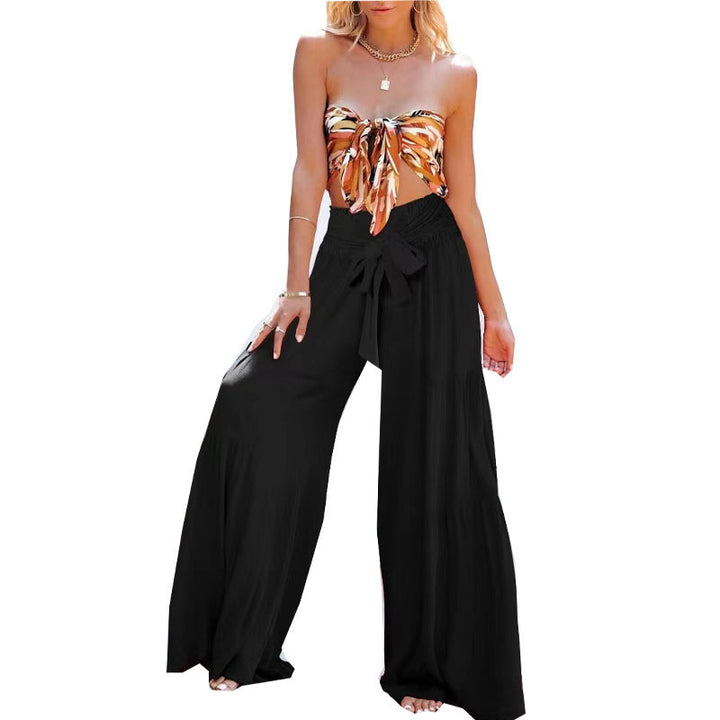 High-waisted wide trousers for women with elegant pleats and a tie belt Lune London