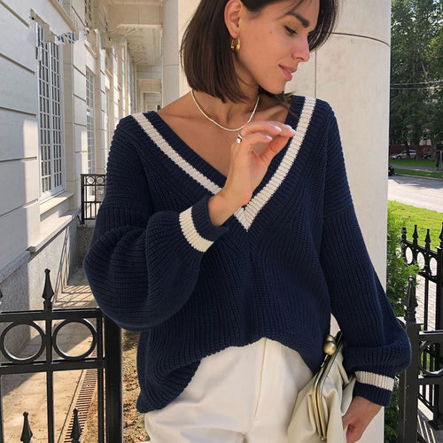 Trendy women's sweater with V-neck, puff sleeves, and textured fabric Amarae