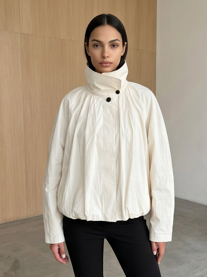 Women's short jacket with high stand-up collar, gathered shoulder area, and elastic hem Amarae