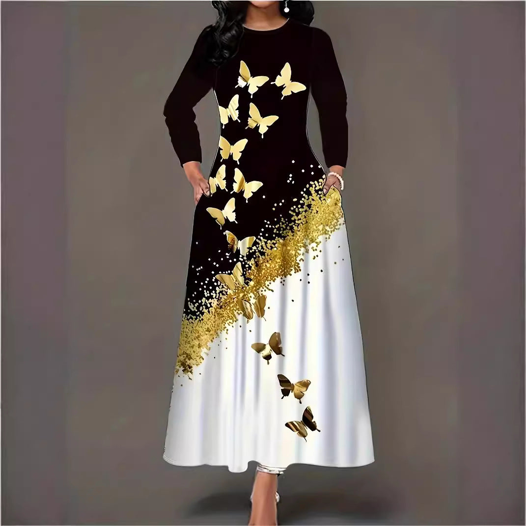 Maxi dress for women with an elegant butterfly pattern and a sparkling gold accent Lune London