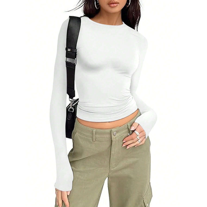 Chemise basique à manches longues pour dames avec un élégant col rond Chic & Stil