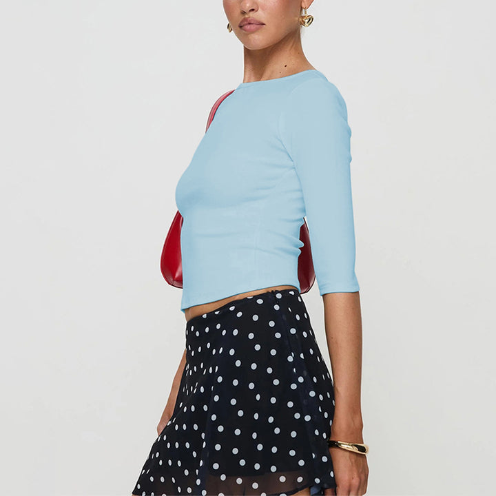 Cropped long sleeve shirt for women with an elegant round neckline and a cut that highlights the silhouette Chic & Stil