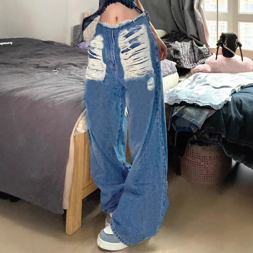 Women's high-cut wide denim jeans with heavily distressed front and raw waistband Amarae