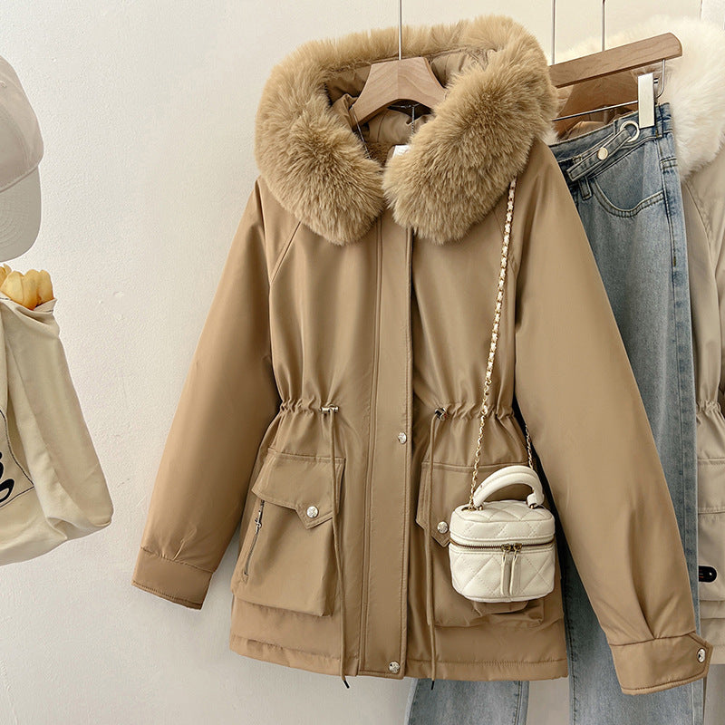 Multifunctional winter jacket for women with removable faux fur collar and adjustable waist drawstring Lune London