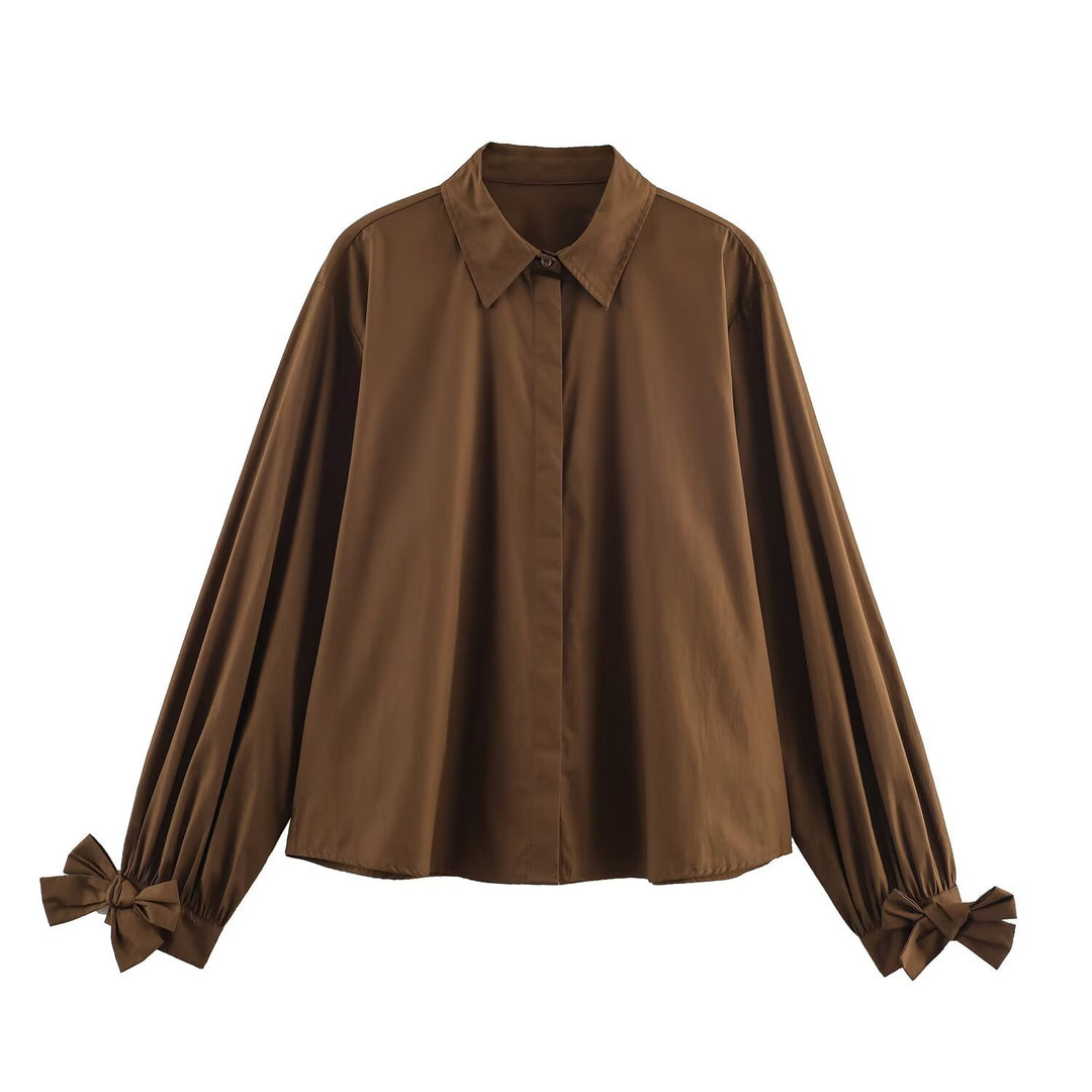 Women's oversized shirt blouse with classic collar, balloon sleeves, and bow cuffs Amarae