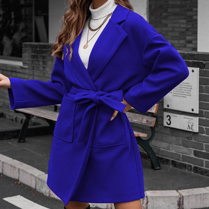 Ladies wrap coat with tie belt, large flap pocket and lapel collar Amarae
