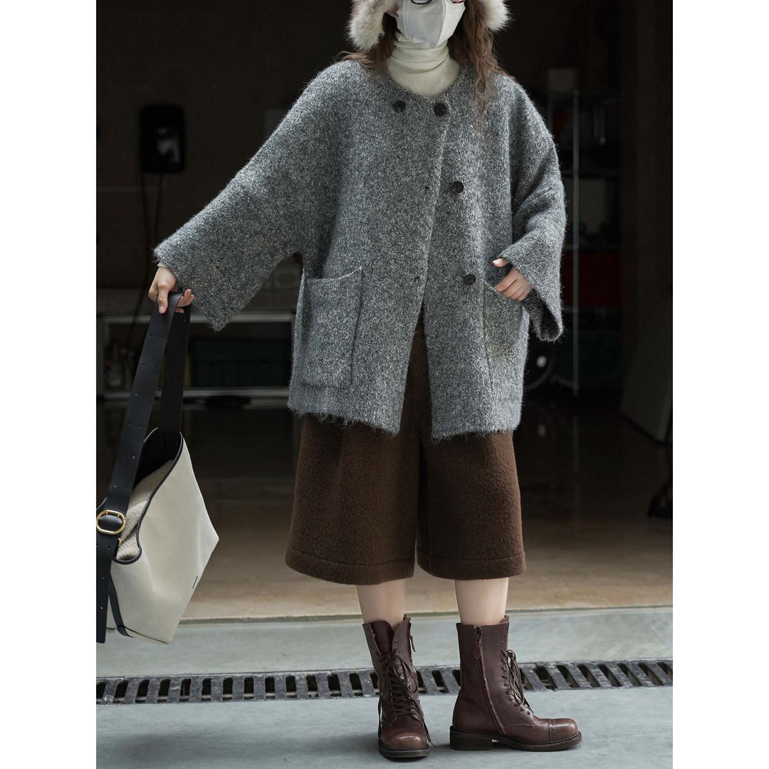 Women's short jacket in mohair look with round neck, button placket, and patch pockets Amarae