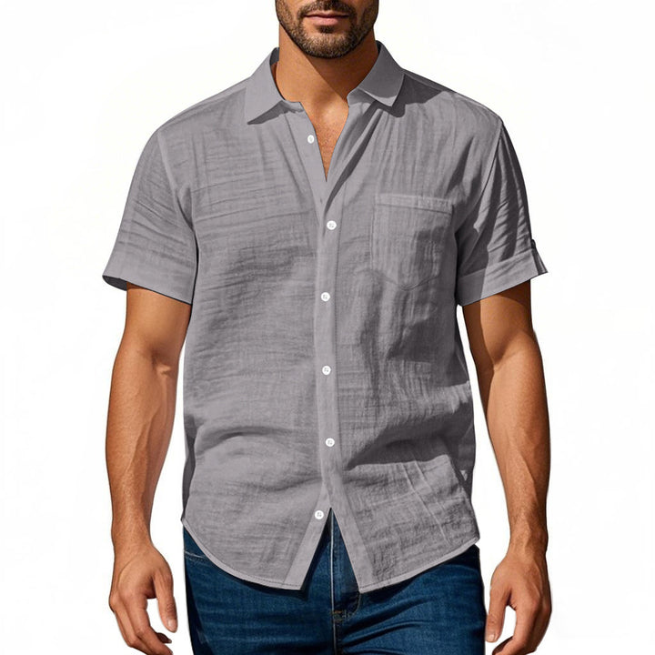 Short sleeve linen shirt for men with structured design and practical chest pocket Lune London