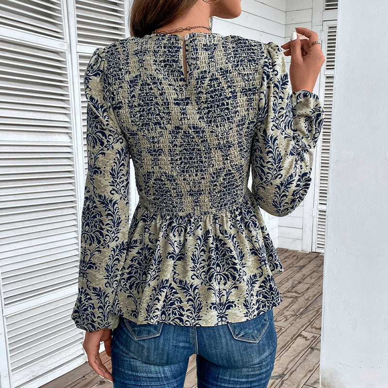 Elegant shirt for women with voluminous sleeves and a floral pattern Lune London