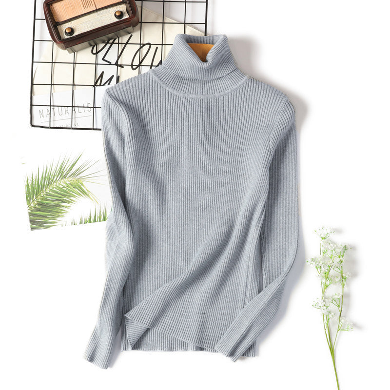 Women's turtleneck sweater with a fine ribbed texture and a fitted cut Lune Londonl