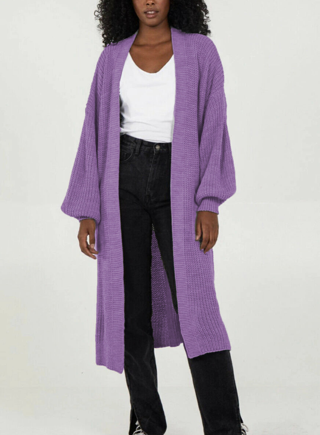Plus size knitted cardigan for women with voluminous sleeves and an opening at the front Lune Londonl
