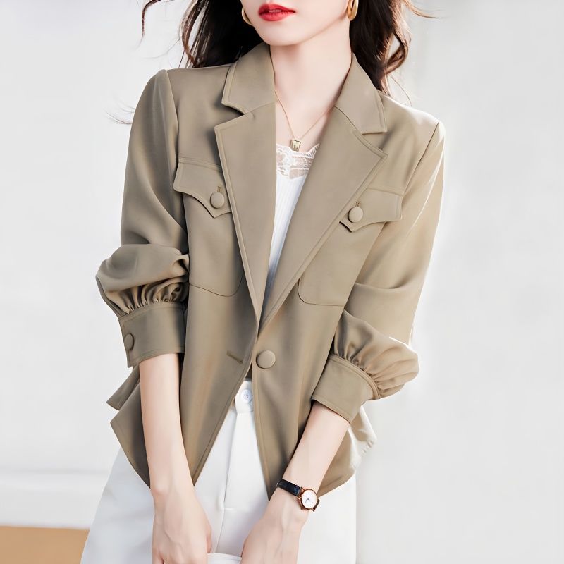 Blazer élégant pour dames avec des manches bouffantes structurées Chic & Stil